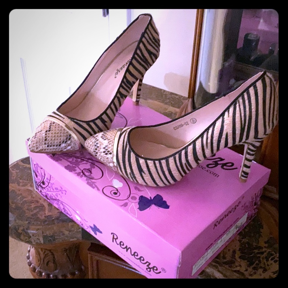 Nude and black Zebra /snake skin pumps